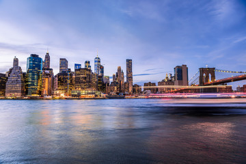 Outdooors view on NYC New York City Brooklyn Bridge Park by east river, cityscape skyline at...