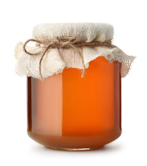 Glass jar of honey