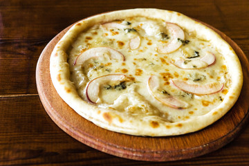 delicious pizza with meat, cheese and mushrooms	