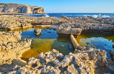 Backwaters at the Dwejra coast, Gozo, Malta