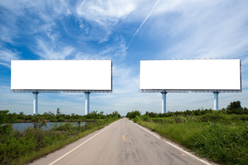 Two blank billboard on the sideway in the park. image for copy space, advertisement, text and object. white billboard in natural green. Blank billboard ready for new advertisement.
