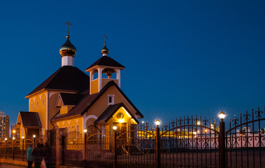 Fototapeta premium Church at evening in blue sky