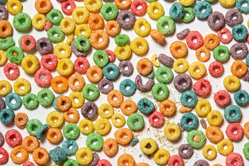background of colorful cereal rings. breakfast food. flat lay, top view