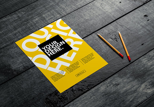 Paper Flyer with Pencils on Wooden Surface Mockup