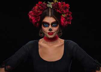 Creative image of Sugar Skull. Neon makeup for Halloween or Dia De Mertos holiday.