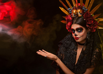 Creative image of Sugar Skull. Neon makeup for Halloween or Dia De Mertos holiday.