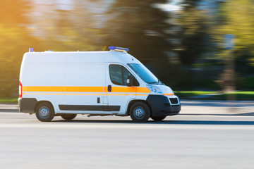 Ambulance in the city on a blurred background