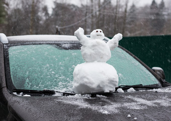 snowman on the car hood