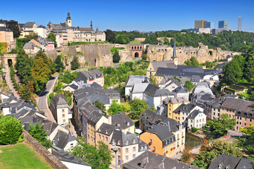 View from the city ramparts down to the Plateau du Rham & Grund areas of Luxembourg city, the Grand Duchy Luxembourg. - obrazy, fototapety, plakaty