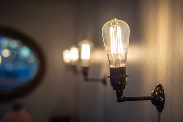 Incandescent lamps in a modern cafe. Edison lamp.
