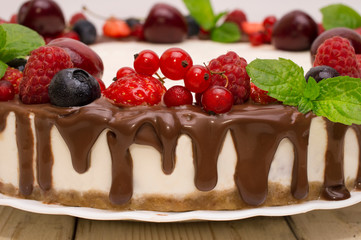 Sweet Cake with fresh berries on wooden background. Top view
