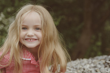 Cherish all your happy moments. Little child wear long hair. Small girl with blond hair. Happy little child with adorable smile. Small girl happy smiling. A full head of hair