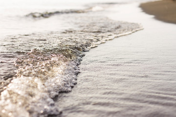 wave of the Black sea in the light of sunset