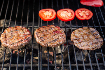 Barbecue juicy grilled burger cutlets from fresh beef.