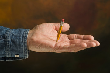 pencil piercing hand