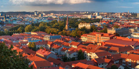 Scenic aerial view of the Old Town with Haga Church and red roofs at sunset, Gothenburg, Sweden.