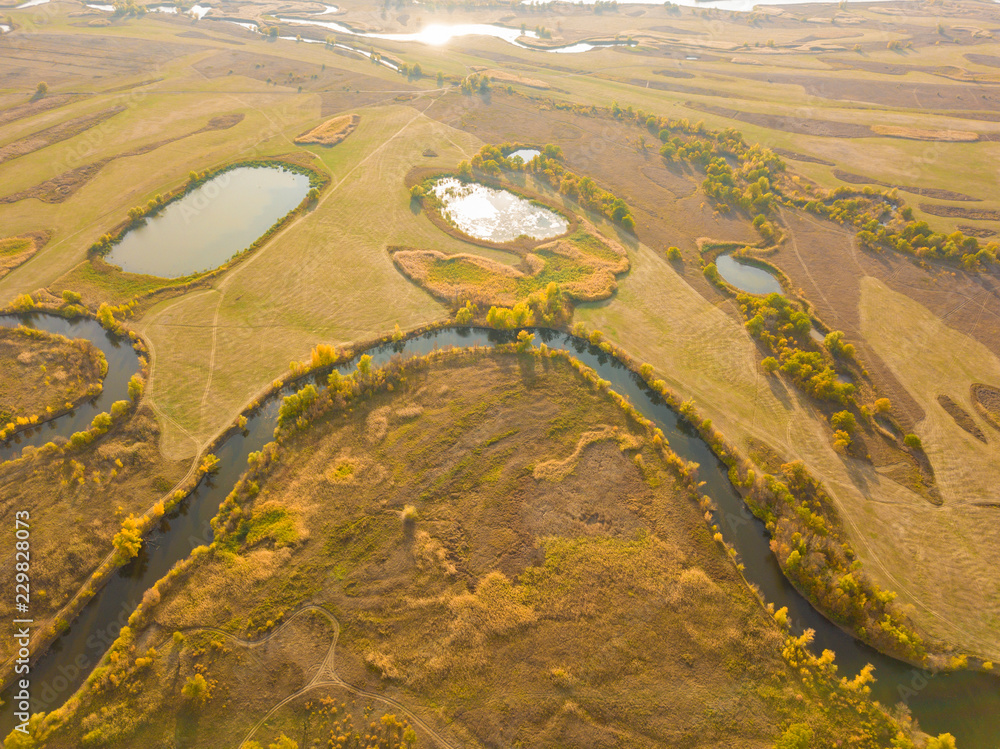 Wall mural aerial summer river in the forest and field lanscape, amazing epic view f