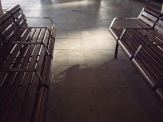 Retro wooden benches at a train station