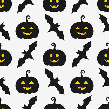 Halloween pumpkins and bats seamless pattern