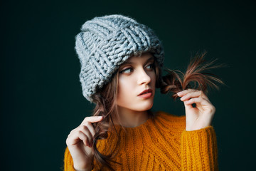 Hair care, health, beauty, split ends, advertising concept. Close up studio portrait of young sad,...