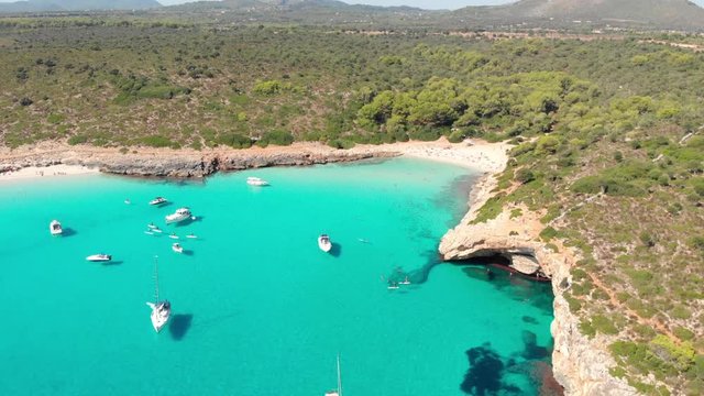 Aerial footage on Cala Varques beach, Mallorca. A hidden paradise with crystal clear water.