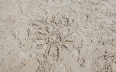 Sun on sand on beach holiday background sign concept