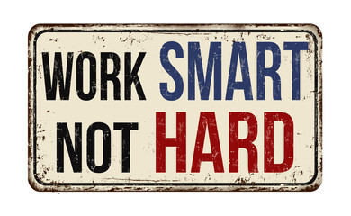 Obraz premium Work smart not hard vintage rusty metal sign