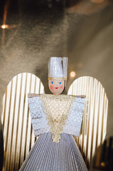 Traditional handmade tinsel angel doll so called Rauschgoldengel, made of gold foil, a festive Christmas decoration from or souvenir gift from the Christkindles Market in Nuremberg, Bavaria, Germany