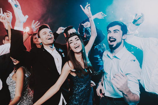 Smiling People Celebrating New Year on Party.