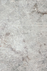 Detailed texture of gray metal surface with scratches close up. Background of old steel panel.