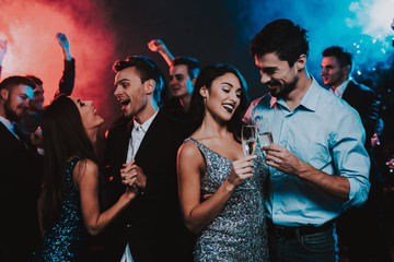 Happy Young People Dancing on New Year Party.