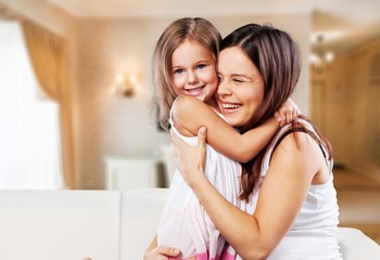 Happy Mother and daughter hugging