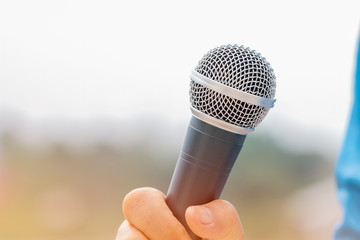 Seminar Conference Concept : hands businesspeople holding microphones for speech or speaking  in...