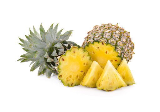 cut fresh pineapple on white background