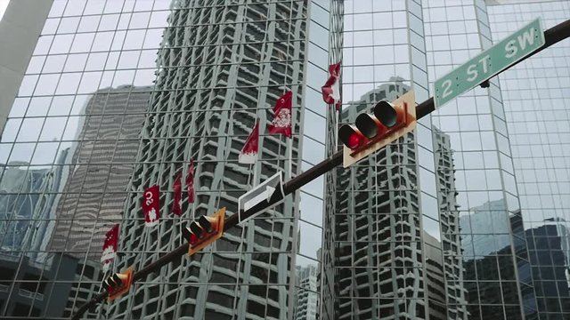 Calgary Stampede Flags with wind blowing over 2nd St SW
