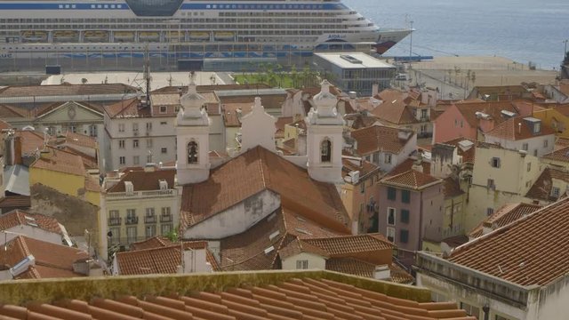 Rooftop views from Miradouro das Portas do Sol filmed in Lisbon, Portugal. Aida Sol Cruise ship can be seen in the distance.