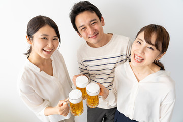young asian group drinking beer