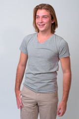 Obraz premium Young handsome man with long blond hair