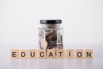 Education Concept Bottle of Coins