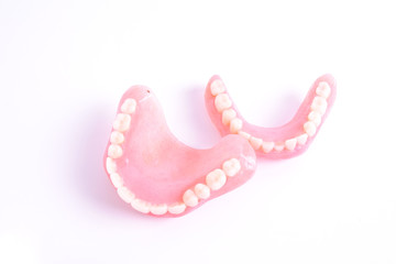 A set of dentures isolated on a white background.