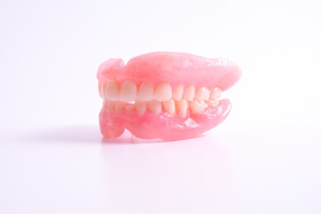 A set of dentures isolated on a white background.