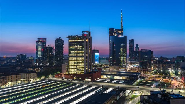 Milan Skyline aerial view from day to night time lapse video