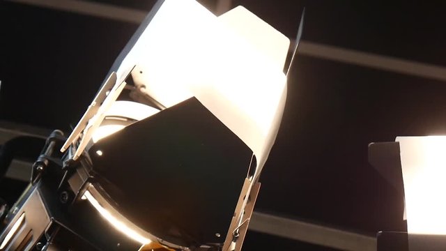 Close-up looking up at professional studio lights for film and tv production