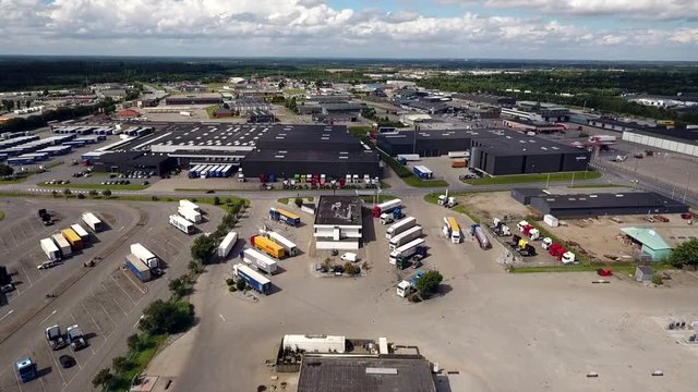 Climbing arial footage of the transport capital city in Denmark showing the town and traffic.