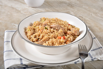 Bowl of fried rice with chicken