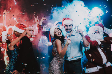 Happy Young People Dancing on New Year Party.