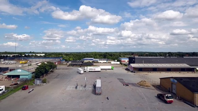 Climbing arial footage of the transport capital city in Denmark showing the town and traffic.