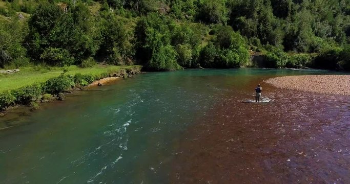 Man fishing on the banks of the Traidor River, Chilean Patagonia
