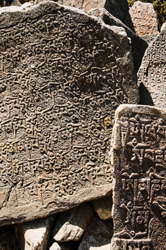 Buddhist scripture carved into stone