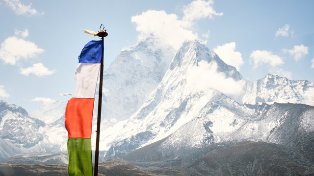 A prayer flag with Ama Dablam in the background